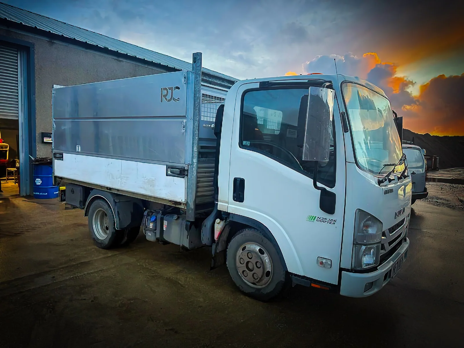 RWG Engineering tipper truck outside the workshop at dusk